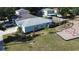 Aerial view showcasing property backyard and nearby community playground at 1006 Harvest Moon Dr, Seffner, FL 33584