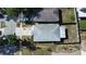 Aerial view of home showcasing backyard and surrounding neighborhood at 1006 Harvest Moon Dr, Seffner, FL 33584