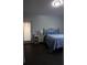 This bedroom has stylish hardwood floors and access to the outside at 1006 Harvest Moon Dr, Seffner, FL 33584