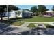 A well-maintained home with a nearby community playground at 1006 Harvest Moon Dr, Seffner, FL 33584