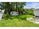View of the backyard featuring a backyard shed at 10215 N 23Rd St, Tampa, FL 33612