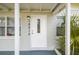 Inviting front door with decorative glass, enhancing the home's curb appeal and entrance at 10215 N 23Rd St, Tampa, FL 33612