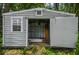 Backyard shed with open doors at 10215 N 23Rd St, Tampa, FL 33612