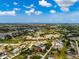 Panoramic aerial view of the home's location in a large residential area at 10237 Deerwood Ave, Englewood, FL 34224