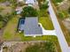 Overhead view of the home and its in-ground pool at 10237 Deerwood Ave, Englewood, FL 34224