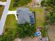 Aerial view of a property featuring a screened in pool at 10237 Deerwood Ave, Englewood, FL 34224
