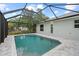 Backyard pool area with privacy screen and plenty of space at 10237 Deerwood Ave, Englewood, FL 34224