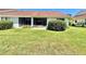 A backyard with a small patio at 10636 Millriver Dr, New Port Richey, FL 34654