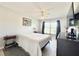 Serene bedroom with a ceiling fan, light-colored walls, and hardwood floors at 10636 Millriver Dr, New Port Richey, FL 34654