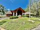 Exterior view of the community clubhouse at 10636 Millriver Dr, New Port Richey, FL 34654