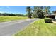 A grass lawn and driveway at 10636 Millriver Dr, New Port Richey, FL 34654