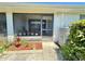 An exterior patio with lush foliage around it at 10636 Millriver Dr, New Port Richey, FL 34654