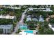 Overhead view shows pool and shuffleboard amenity within the property at 11485 Oakhurst Rd # 310, Largo, FL 33771