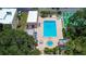 Aerial view of the pool and outdoor community space of this property with multiple activities at 11485 Oakhurst Rd # 310, Largo, FL 33771