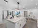 Open-concept kitchen boasts a large island, modern appliances, and seamless flow to the living areas at 1154 64Th S Ave, St Petersburg, FL 33705