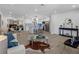 Spacious, bright living room with an open floor plan flowing to the dining room and kitchen at 1154 64Th S Ave, St Petersburg, FL 33705