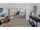 Bright, spacious living room flowing into the open-concept kitchen with a breakfast bar and dining area at 1154 64Th S Ave, St Petersburg, FL 33705