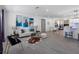 Bright, open living room featuring modern décor, an open floor plan, and recessed lighting at 1154 64Th S Ave, St Petersburg, FL 33705