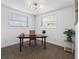 Sunlit office with desk, chair, globe, and two windows providing ample light at 1154 64Th S Ave, St Petersburg, FL 33705