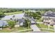 A beautiful aerial shot of a lakeside house near a golf course at 1222 Rainbrook Cir, Valrico, FL 33596
