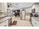 Bright kitchen featuring granite countertops, stainless steel appliances, and an open design at 1222 Rainbrook Cir, Valrico, FL 33596