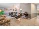 Spacious living room with tile flooring, a high ceiling, and stylish furnishings at 1222 Rainbrook Cir, Valrico, FL 33596