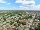 Aerial view of a quiet neighborhood with well-kept homes and tree-lined streets, perfect for peaceful living and curb appeal at 12316 Eldon Dr, Largo, FL 33774