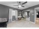 Bedroom features hardwood floors, a makeup vanity, and a large closet with mirrored doors at 12316 Eldon Dr, Largo, FL 33774