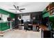 Home office with custom built desk, hardwood floors, and a large window for plenty of natural light at 12316 Eldon Dr, Largo, FL 33774