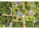 Desirable property with mature trees, a long driveway, and a lush green lawn in a serene setting at 13321 Lewis Raulerson Rd, Dover, FL 33527
