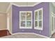 Dining area features white shutters, decorative lighting, and colorful accent wall at 13321 Lewis Raulerson Rd, Dover, FL 33527
