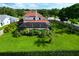 Lovely aerial view of a home featuring a screened-in pool area and beautifully landscaped backyard at 1649 Ledgestone Dr, Brandon, FL 33511