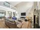 Bright living room with a fireplace, hardwood floors and contemporary furnishings at 1649 Ledgestone Dr, Brandon, FL 33511