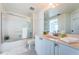 Inviting bathroom featuring a vanity, shower with glass door, and tile flooring at 16600 Gulf Blvd # 437, North Redington Beach, FL 33708