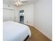 Bright bedroom with a ceiling fan and double closets at 16600 Gulf Blvd # 437, North Redington Beach, FL 33708