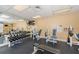 Community gym featuring exercise equipment including weights, benches, and machines at 16600 Gulf Blvd # 437, North Redington Beach, FL 33708
