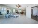 Open-concept living room with tile flooring and lots of natural light at 16600 Gulf Blvd # 437, North Redington Beach, FL 33708