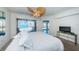 Comfortable main bedroom with a balcony and scenic views at 16600 Gulf Blvd # 437, North Redington Beach, FL 33708