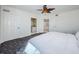 Sun-filled main bedroom with open door to ensuite bath at 16600 Gulf Blvd # 437, North Redington Beach, FL 33708