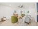 Cozy living room featuring stylish decor, a ceiling fan, and an open layout for entertaining and relaxing at 2017 Rebecca Dr, Clearwater, FL 33764
