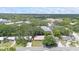 Located in a mature neighborhood, this single-story home has a red tile roof, with trees at 2333 Indigo Dr, Clearwater, FL 33763