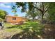 Spacious backyard with a patio area for outdoor seating at 2333 Indigo Dr, Clearwater, FL 33763