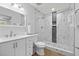 Modern bathroom featuring a glass-enclosed shower with elegant tile work and a vessel sink at 2333 Indigo Dr, Clearwater, FL 33763