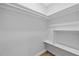 Walk-in closet with shelving, providing ample storage space at 2333 Indigo Dr, Clearwater, FL 33763