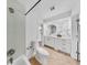 Bathroom featuring tile floors, stylish vanity, and large shower at 2401 Roberta Ln, Clearwater, FL 33764