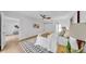 Bright main bedroom with sliding barn door and modern interior design at 2401 Roberta Ln, Clearwater, FL 33764