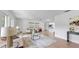 Bright living room boasting a modern design, hardwood floors, and elegant neutral furniture at 2401 Roberta Ln, Clearwater, FL 33764