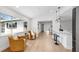 Bright living room showcasing modern furniture, large windows offering natural light, and an open floor plan at 2401 Roberta Ln, Clearwater, FL 33764