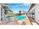 Enjoy the Florida lifestyle with this lovely pool featuring a screened enclosure and brick-paved deck at 2401 Roberta Ln, Clearwater, FL 33764