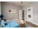 This well-lit bedroom features a bed and toys, creating a playful and inviting space at 2412 W Prospect Rd, Tampa, FL 33629